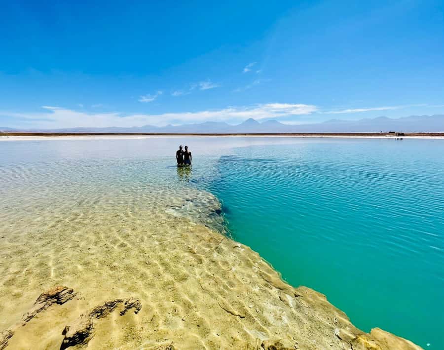 From San Pedro de Atacama: Laguna Cejar E-biking Adventure - Arriving at turquoise Laguna Cejar