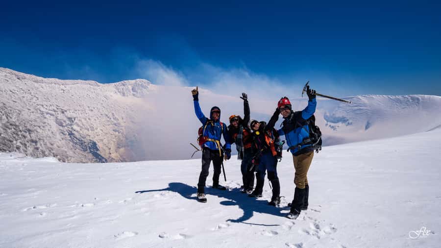 Pucón: Ascent to Villarrica Volcano - The Descent: Snow Slides or a Long Walk Down