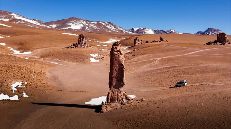 San Pedro de Atacama: Atacama Desert and Salt Flats Day Trip - Pacana’s Monks, giant volcanic forms far from town