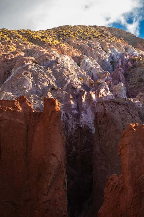 San Pedro de Atacama: Rainbow Valley & Hierbas Buenas Tour - Walking Through Rainbow Valley