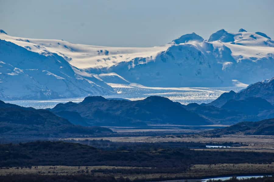 Torres del Paine: Full Day Excursion Torres del Paine + Milodon Cave. - Sarmiento Lake and Laguna Amarga frame the Paine peaks